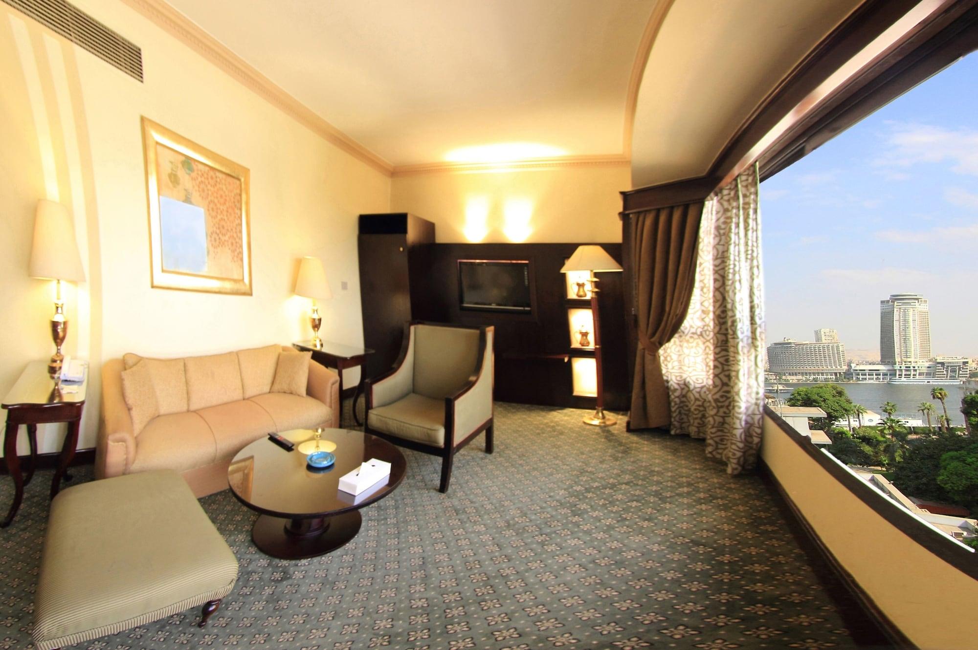 Pyramisa Suites Hotel Cairo Giza Экстерьер фото A room at the hotel
